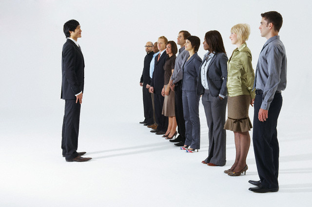 Businessman talking to team